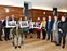 Familiares de donates de fotos, con la consejera Ollo y las autoras de la recopilación y elaboración de los textos del libro.