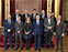 La consejera Ollo y el delegado en Bruselas, Mikel Irujo, en el Salón del Trono con la delegación del Comité de las Regiones.